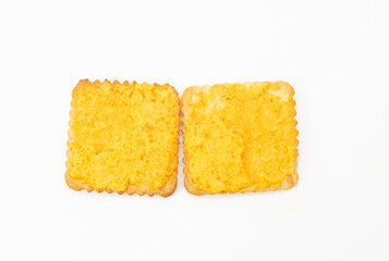 rectangular biscuit with pineapple flavor cream isolated on white,