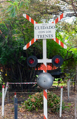 Warning sign at level crossing, write beware of train