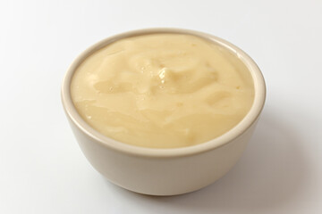 Garlic dipping sauce on white background