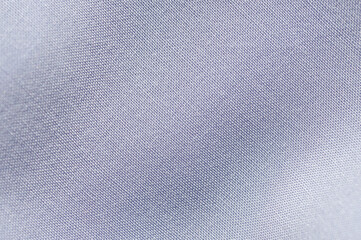 Texture of light blue cotton fabric close up