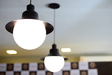 round lamps hanging from the ceiling
