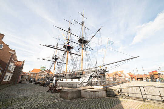 Hartlepool UK - 11th October 2019: HMS Trincomalee wide angle photo with buildings in black and white on sunny day