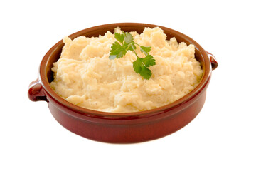 mashed potatoes in an earthen dish on a white background