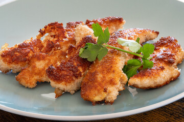 fried chicken with breadcrumbs on a plate