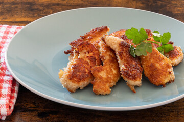 fried chicken with breadcrumbs on a plate
