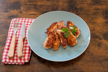 fried chicken with breadcrumbs on a plate