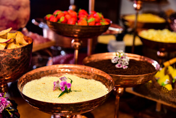 buffet with copper trays
