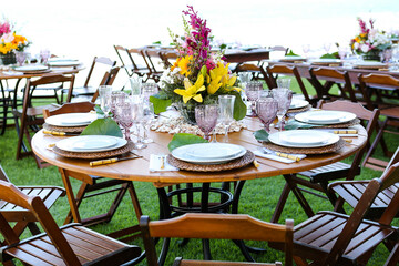 table setting for a party, ornamental flowers