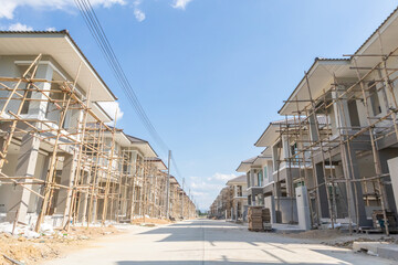 Obraz premium construction residential new house in progress at building site housing estate development