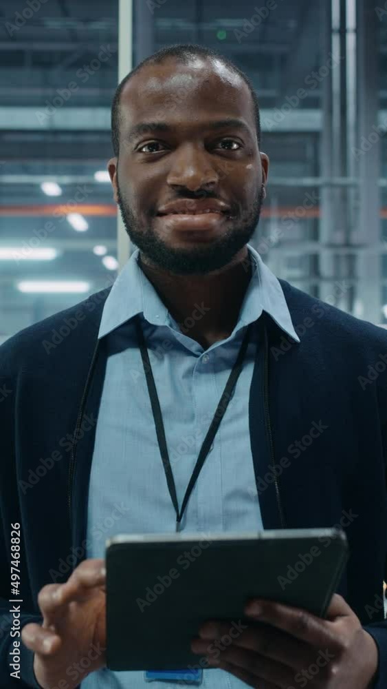 Aufkleber vertical screen. car factory office: portrait of black male chief engineer using tablet computer in 