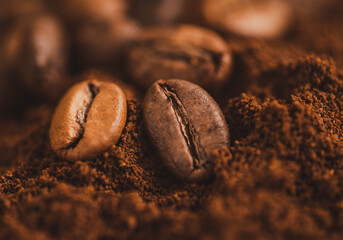 coffee background. copy space with coffee beans. coffee beans on the dining table. closeup of coffee beans. closeup of beans on ground brown coffee.