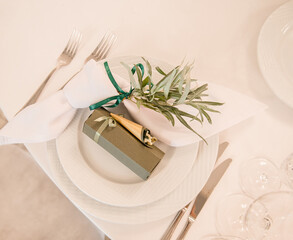 wedding invitations and decorations. small gifts for guests on plates.wedding decor. mockup