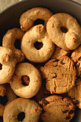 Plate of sugar cookies and chocolate chip cookies on the table. Flat lay.