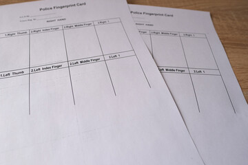 entering into database fingerprints with special paint in police fingerprint card, concept of arresting person suspected of crime, personality identification concept, sweat traces from crime scene