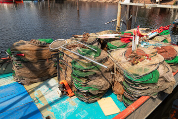 Fishing nets and other fishing tackle on a fishing boat in the harbor of Urk