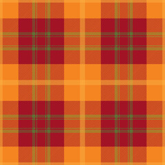 Orange, red and green tartan plaid. Scottish pattern fabric swatch close-up.