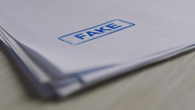 Fake stamp. Fake news. Fake stamp placed on the documents
