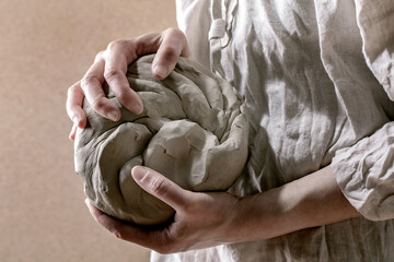 Pottery clay in femail hands