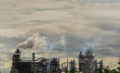 CO2 emissions. CO2 greenhouse gas emissions from factory chimneys. Carbon dioxide gas global air...