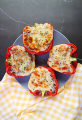 Top View of Fresh Cooked Delectable Stuffed Bell Peppers on Kitchen Table