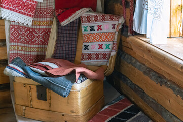 Person in a box. Things are stored in a wooden basket.  Wooden chest for carrying and storing...
