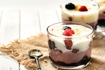 yogurt and fresh fruit dessert and almond sprinkle