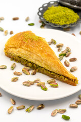 Carrot slice baklava on a white background. Traditional Mediterranean cuisine delicacies. close-up pistachio baklava. Local name havuc dilim baklava