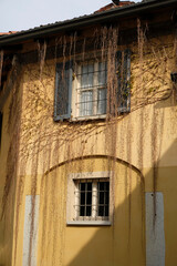 2022 March - old facade and architectural element in the city of Novara - Italy Piedmont.