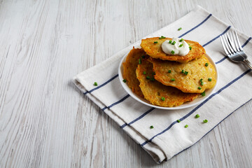 Homemade Boxty Irish Potato Pancakes on a Plate, side view. Space for text.