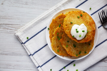 Homemade Boxty Irish Potato Pancakes on a Plate, top view. Flat lay, overhead, from above. Space for text.
