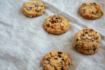 Homemade Chocolate Chip Candy Cookies, low angle view. Space for text.