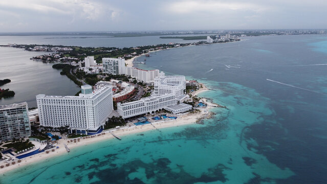 Aerial shot of the Tulum Beach in Cancun with the narrow Caribbean coast surrounded by ocean