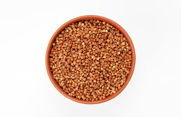 Buckwheat groats in bowls and bags isolated on a white background. High quality photo