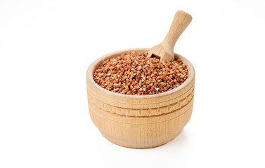Buckwheat groats in bowls and bags isolated on a white background. High quality photo