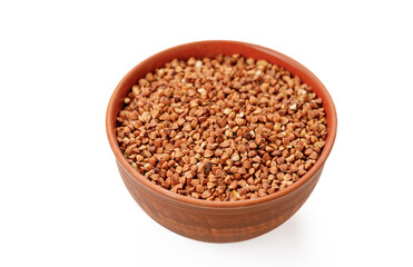 Buckwheat groats in bowls and bags isolated on a white background. High quality photo