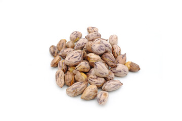 Roasted tiger peanuts on white background.