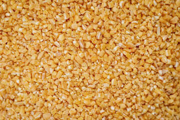 Wheat groats texture background. High quality photo