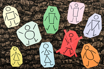 Group of paper notes people with one person crossed. Cancel culture or discrimination concept.