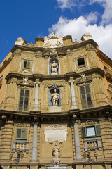 Fototapeta na wymiar Palazzo Di Rudin at baroque square Quattro Canti (Piazza Vigliena) in Palermo, Sicily, Italy 