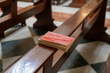 The holy book for prayer lies on the bench in the side hall of the Chapel of Saint Catherine, near to the Church of Nativity in Bethlehem in the Palestinian Authority, Israel