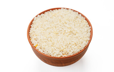 Polished round rice in bowls and bags isolated on a white background. High quality photo