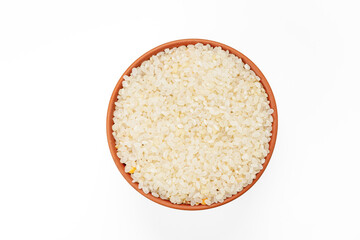 Polished round rice in bowls and bags isolated on a white background. High quality photo