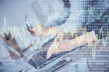 Multi exposure of woman hands typing on computer and financial chart hologram drawing. Stock market analysis concept.
