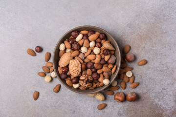 Bowl with nut mix as snack or ingredient for tasty dessert, meal