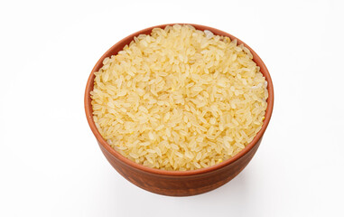 Polished steamed rice in bowls and bags isolated on a white background. High quality photo