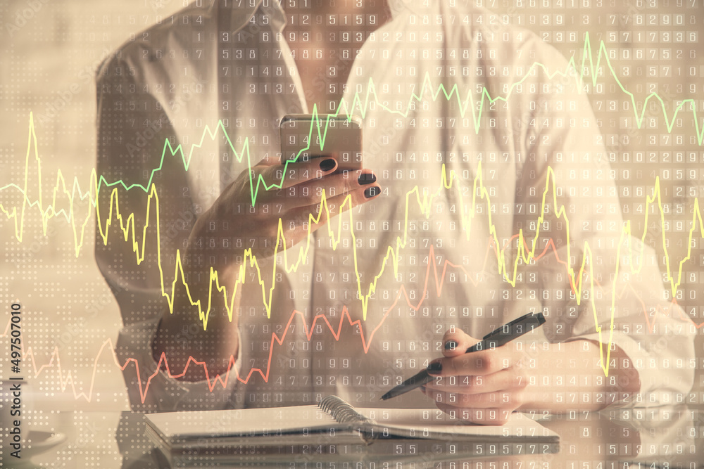 Poster double exposure of financial graph sketch hologram and woman holding and using a mobile device. stoc