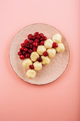 delicious homemade syrniki with honey on a black background