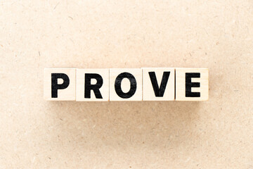 Fototapeta premium Alphabet letter block in word prove on wood background