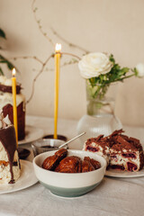 Traditional Ukrainian Easter cake. Traditional dessert. Easter cake stands on a festive table decorated with sweets. Holy Easter
