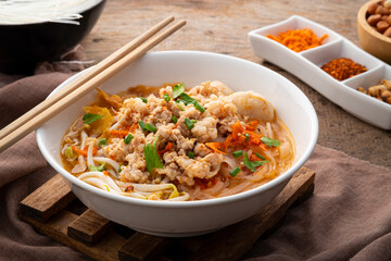 Tom Yum noodle soup ,Rice Stick Noodles with Minced Pork and meatball.popular hot and spicy soup in Thailand